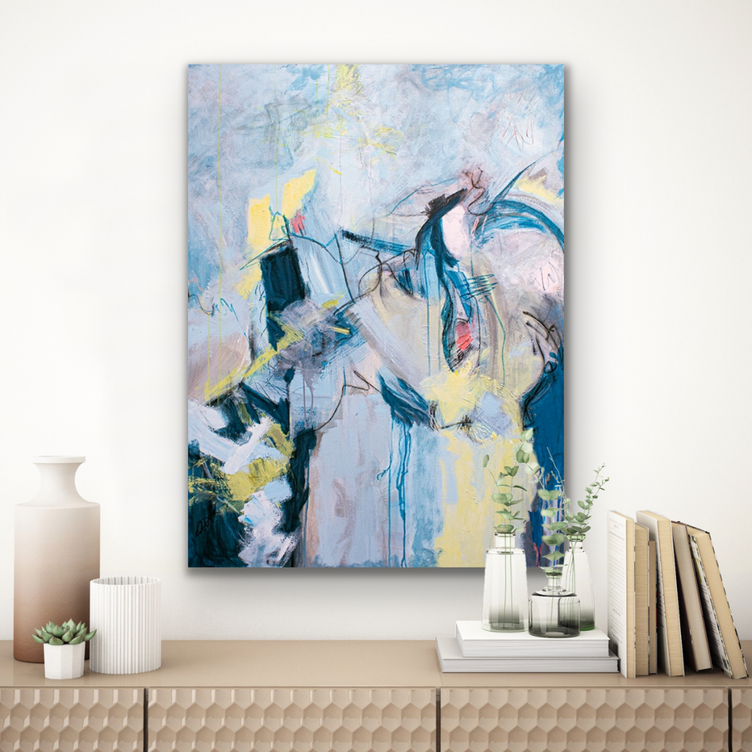 "Free Spirited" is a vertical work of art with warm blues, yellows and greys.