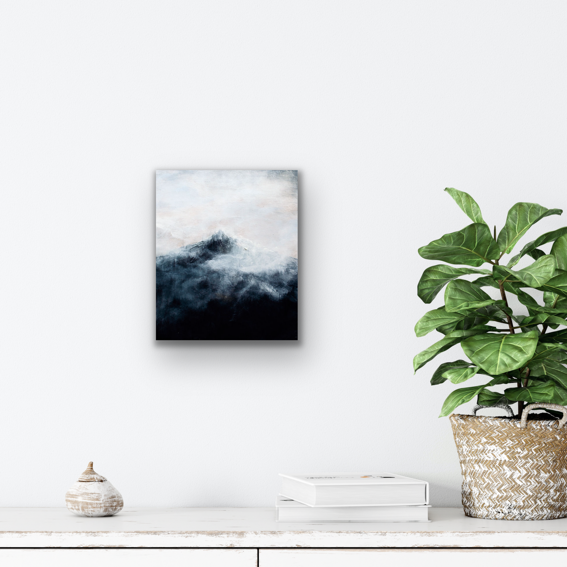 This abstract painting with its deep blues and winter whites will look best on a small wall.