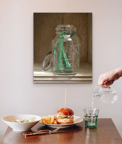 "Preserve" Gumby in a open preserve jar is a whimsical wall art piece that would fit in your kitchen, dining room, kid's room or hallway.