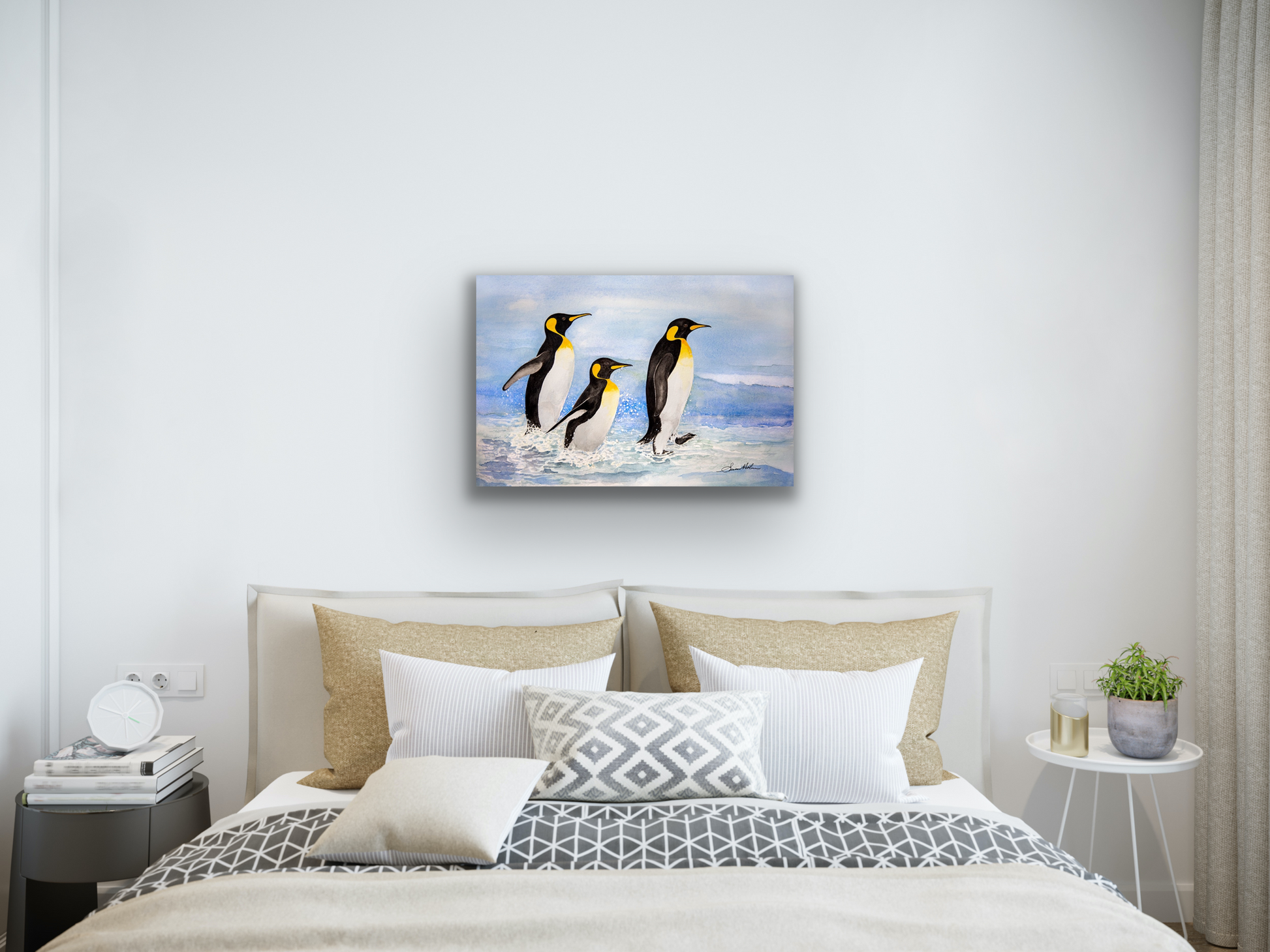 "Spashing" artwork depicts some cute penguins playing in the waves.